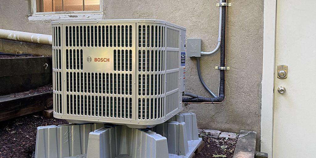 is it worth replacing compressor on ac unit